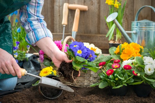 Outdoor gardening staff wearing PPE during site work
